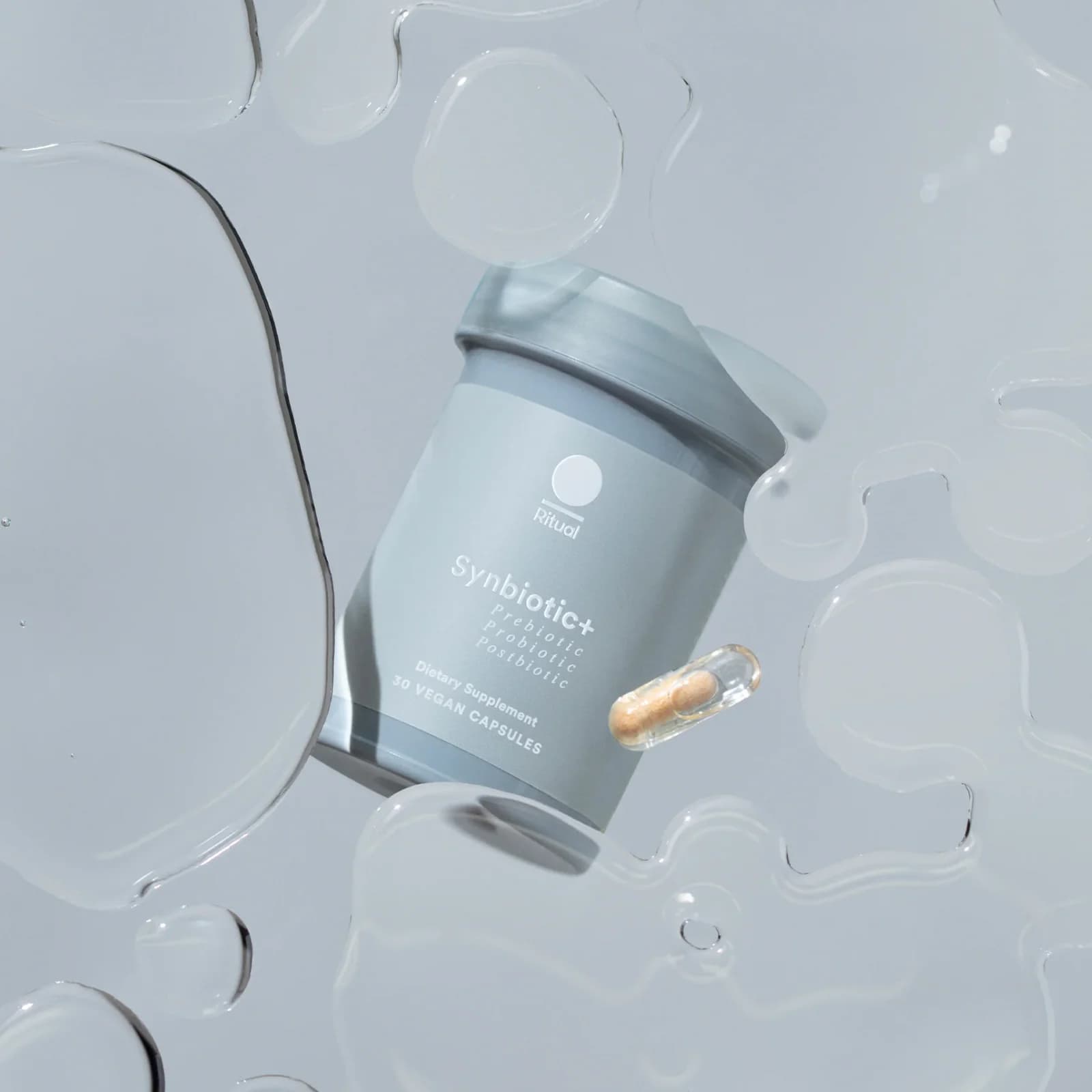 Ritual Synbiotic+ 30-capsule bottle with a capsule